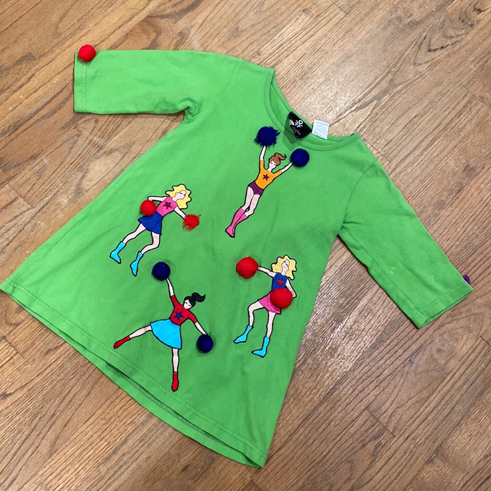 Michael Simon green cheerleader top